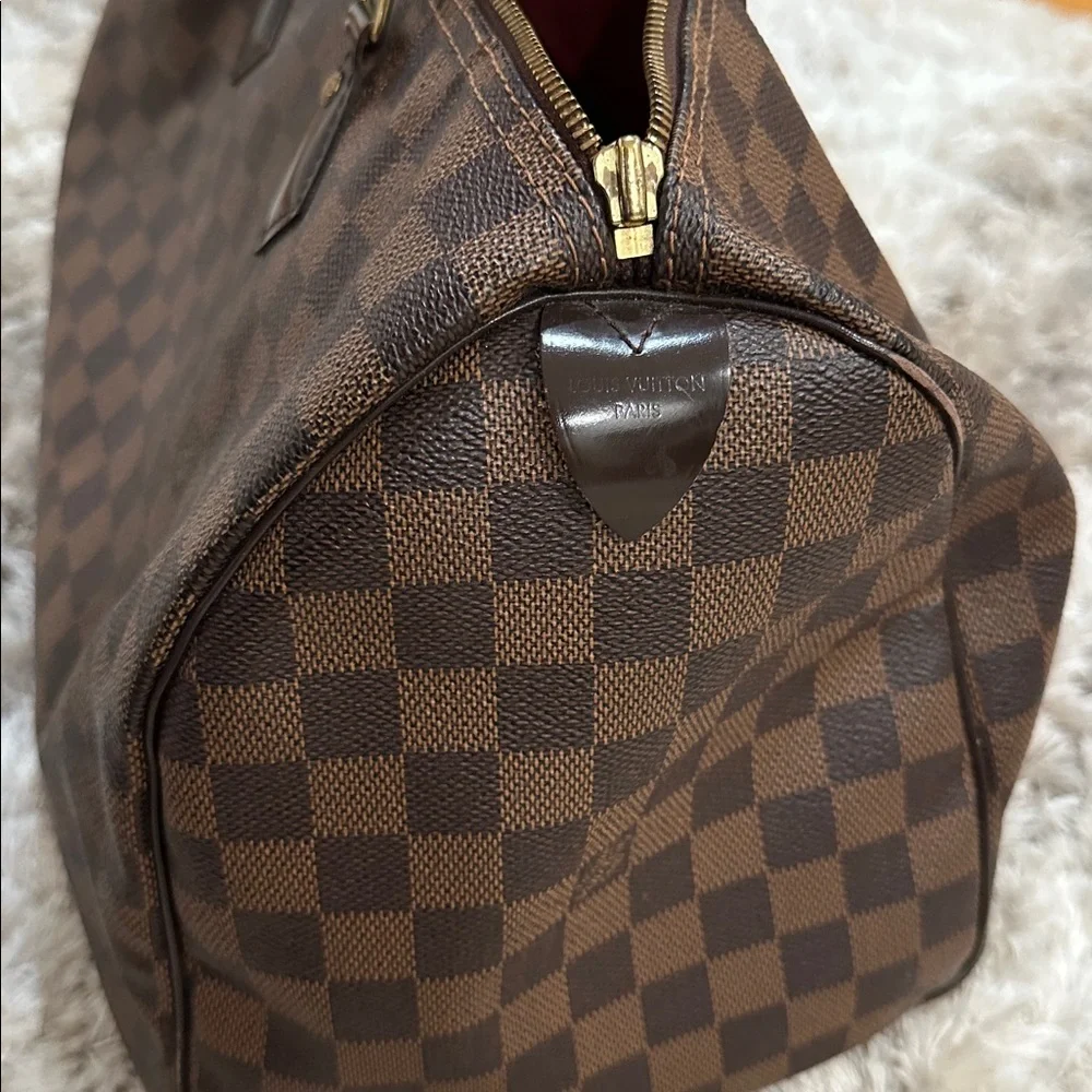 Louis Vuitton
Damier Ebene Speedy 35 - Picture 11 of 11
